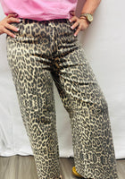 Load image into Gallery viewer, Leopard Raw Hem Jeans
